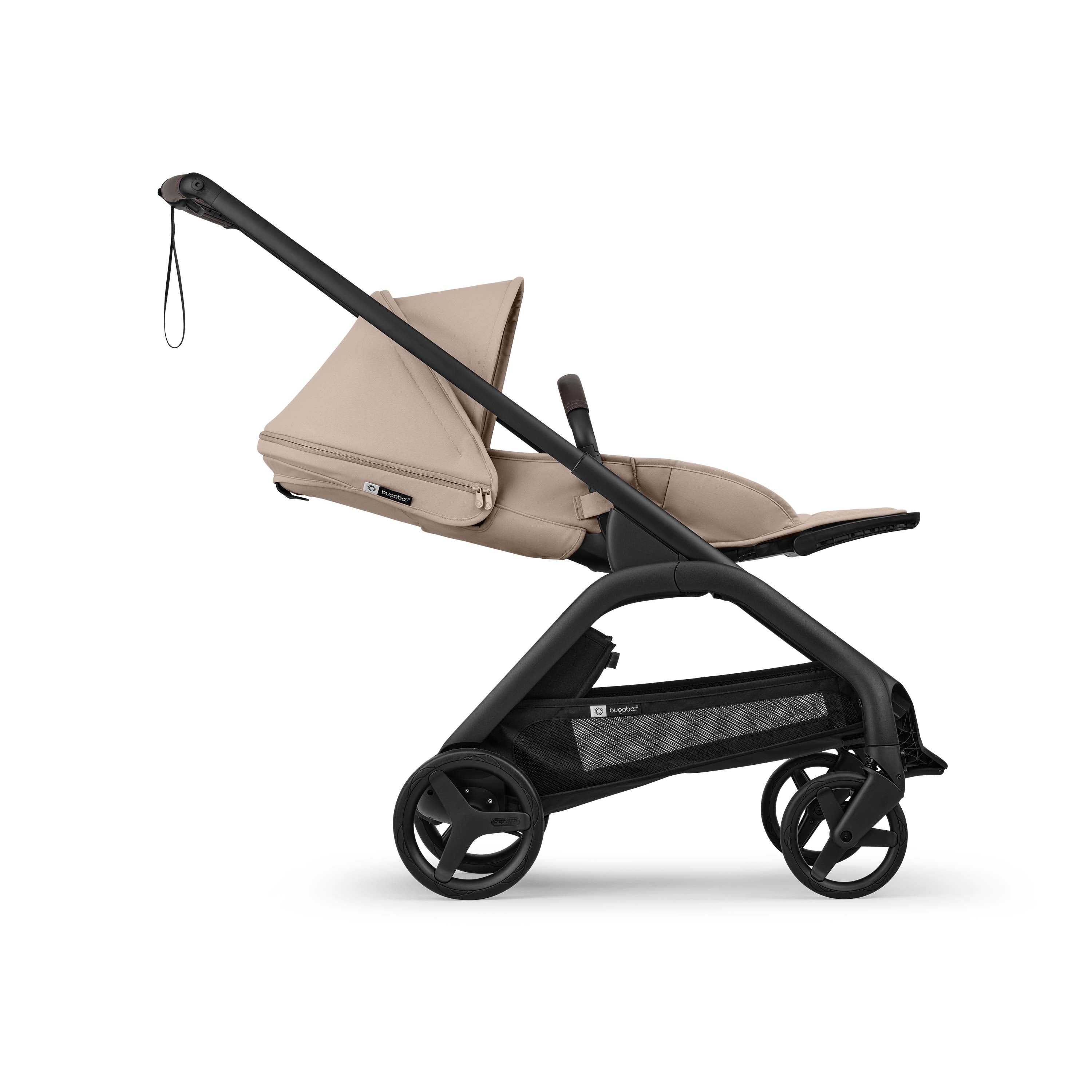 Bugaboo Dragonfly Plus Stroller lie-flat shot world facing in Desert Taupe and black chassis on a white background