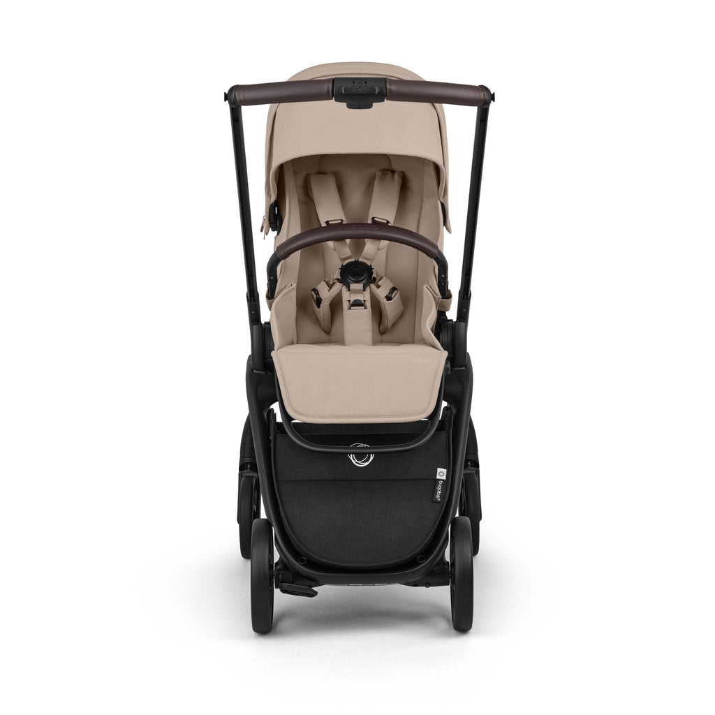 Bugaboo Dragonfly Plus Stroller front shot parent facing in Desert Taupe and black chassis on a white background