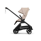 Bugaboo Dragonfly Plus Stroller side shot parent facing in Desert Taupe and black chassis on a white background