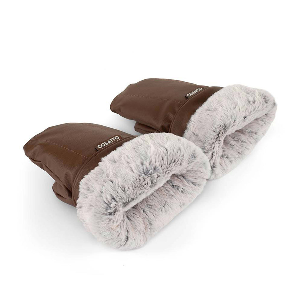 Brown mitts with cuffs turned over showing fur lining on a white background