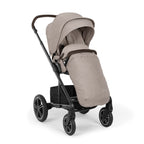 Beige stroller with apron on a white background