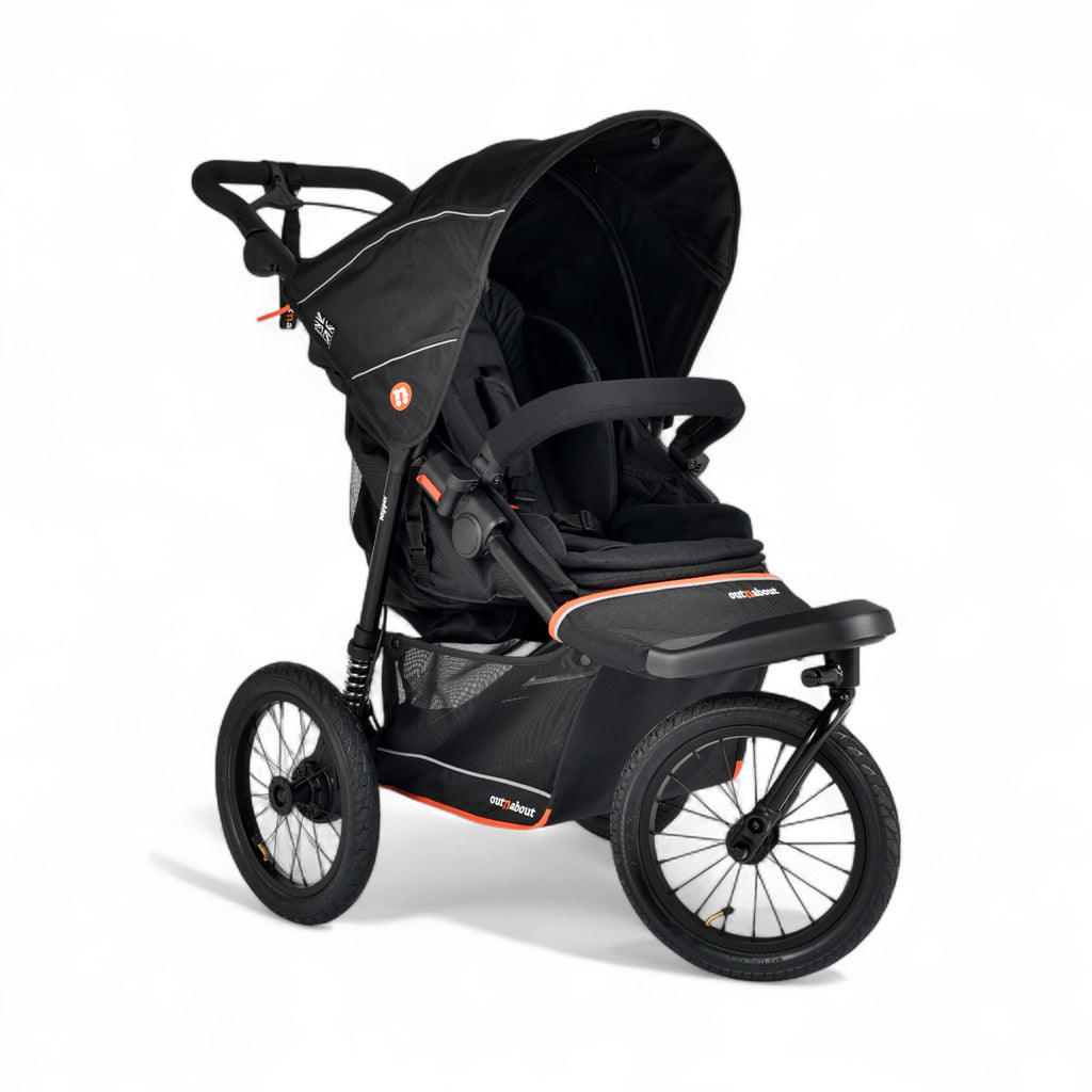 Black stroller with orange accents on a white background