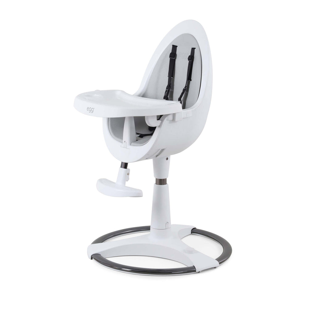 White high chair with grey seat pad, black accents on a white background